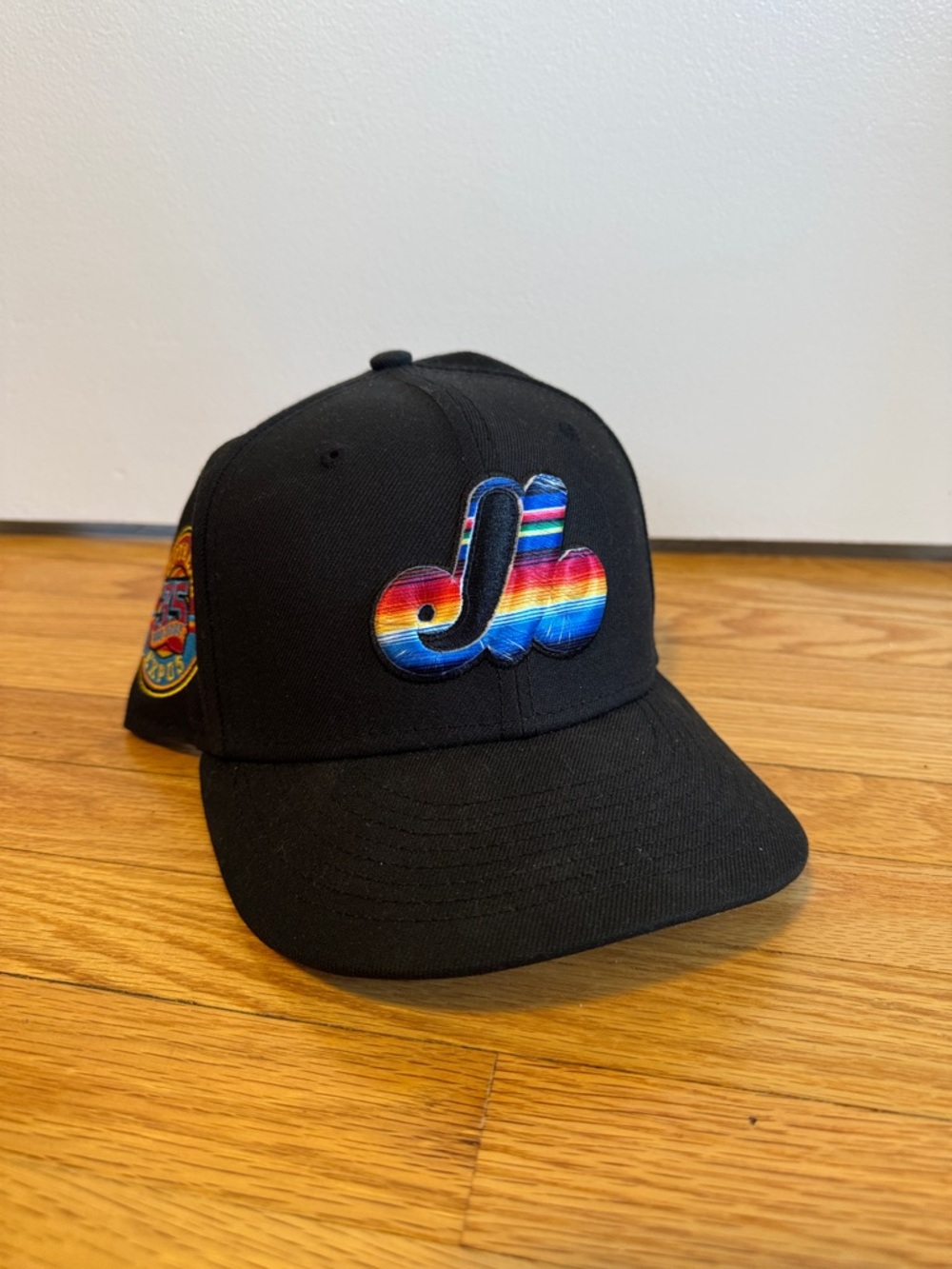 Black Men’s Baseball Cap with Colorful Stripe Logo
